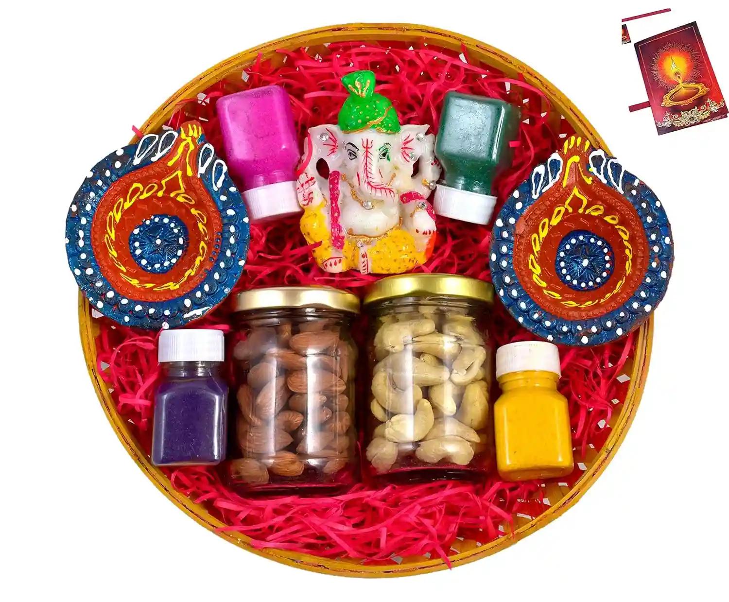 Diwali dry fruits gift box/Diwali gifts/Diwali gift for friends and family/-Decorated Basket+2 Jars of Dry Fruits(Almond and Cashew)+Showpiece figurine+2 beautiful diya+4 Rangoli Colours+Diwali Card