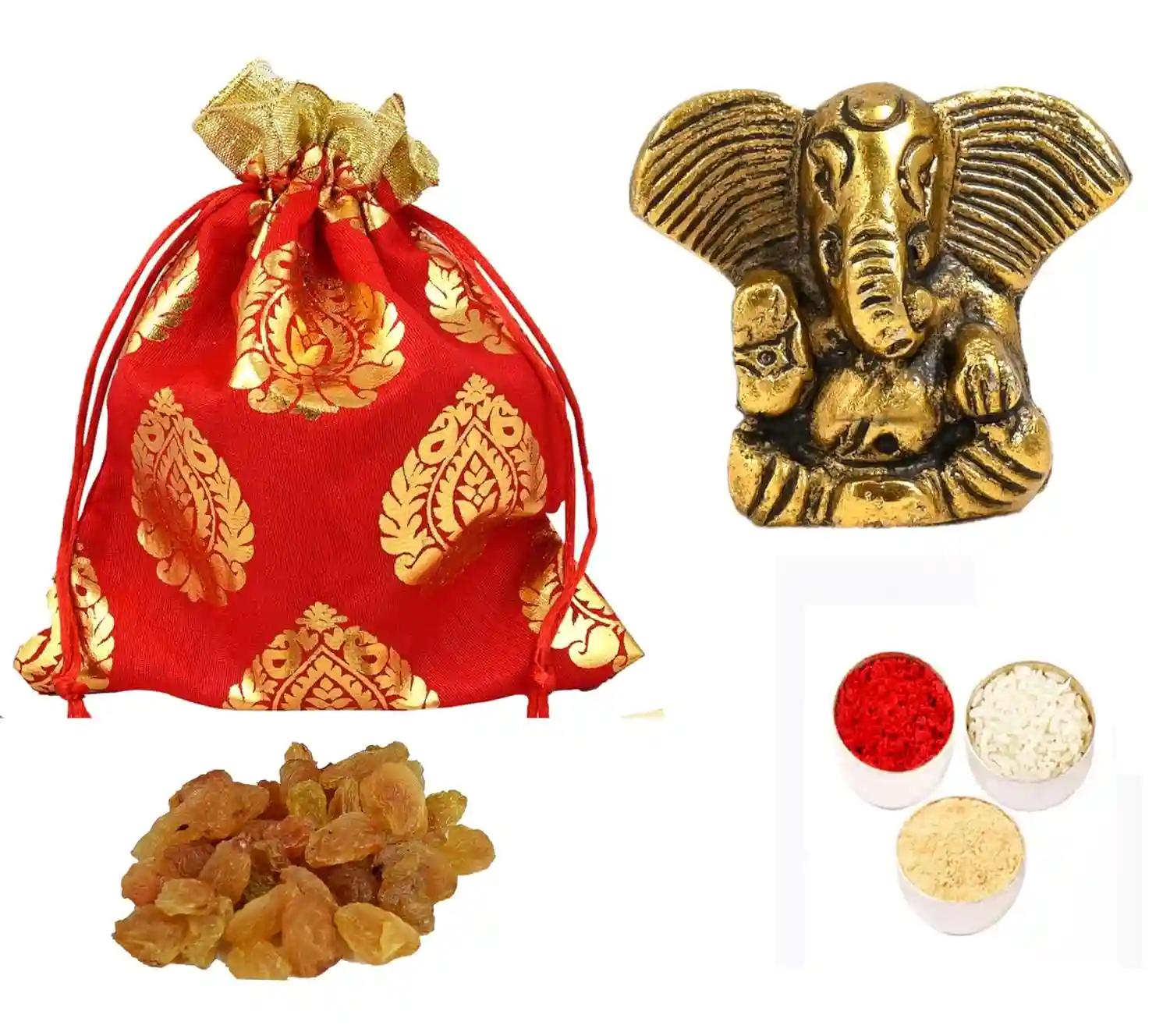 Bhai dooj gift set for brother/bhai dooj gift hamper/bhaiya dooj roli chawal set/bhai dooj gift/bhai dooj tika/bhaiya dooj gift for brother-potli of cashew+metal ganesha idol+roli chawal chandan